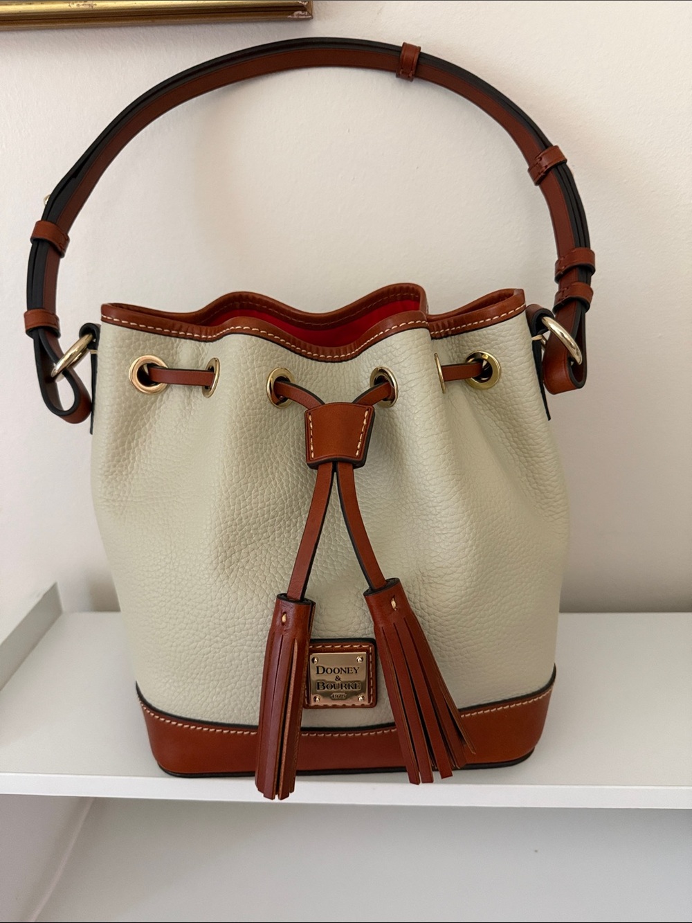 Cream and Tan Women's Bucket Bag with Tassel